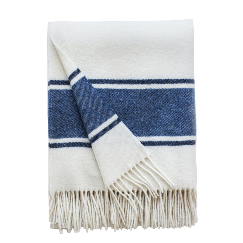 White and blue striped blanket with fringes on a white background