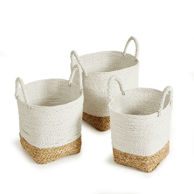 3 white and natural woven baskets with handles on white background