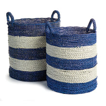 2 blue and white stripe rattan baskets with handles on white background
