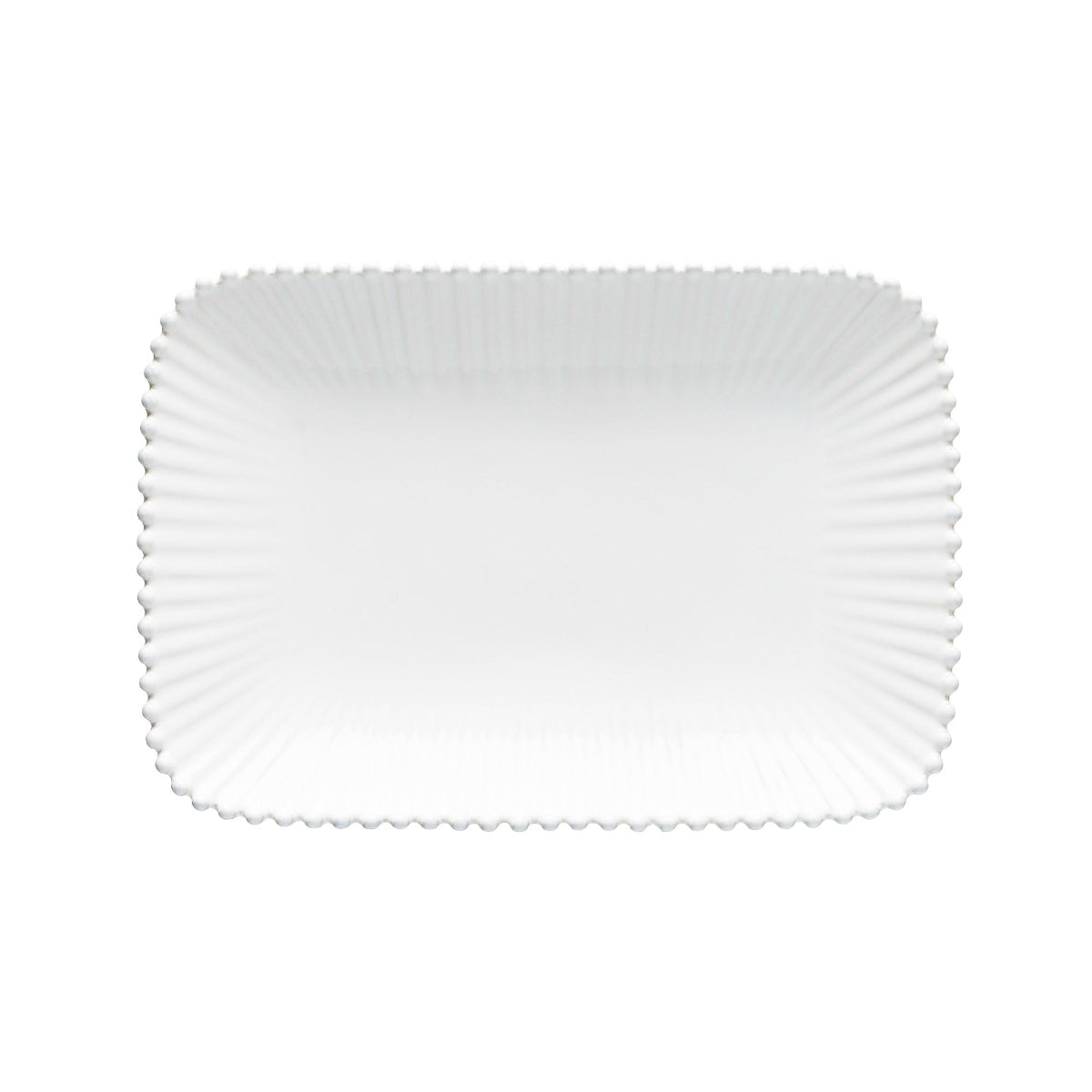 White ceramic plate with a textured rim on a white background