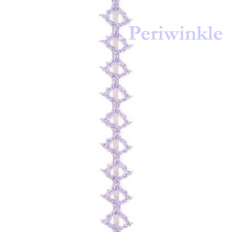 Periwinkle-colored decorative border with geometric pattern on a white background