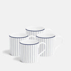 Set of four white mugs with blue stripes on a light gray background