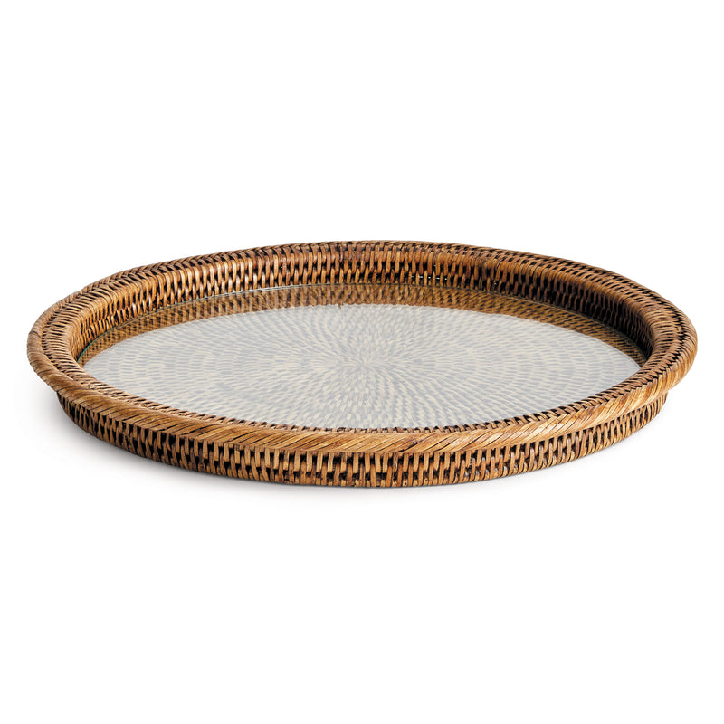 Circular rattan tray with glass insert on white background