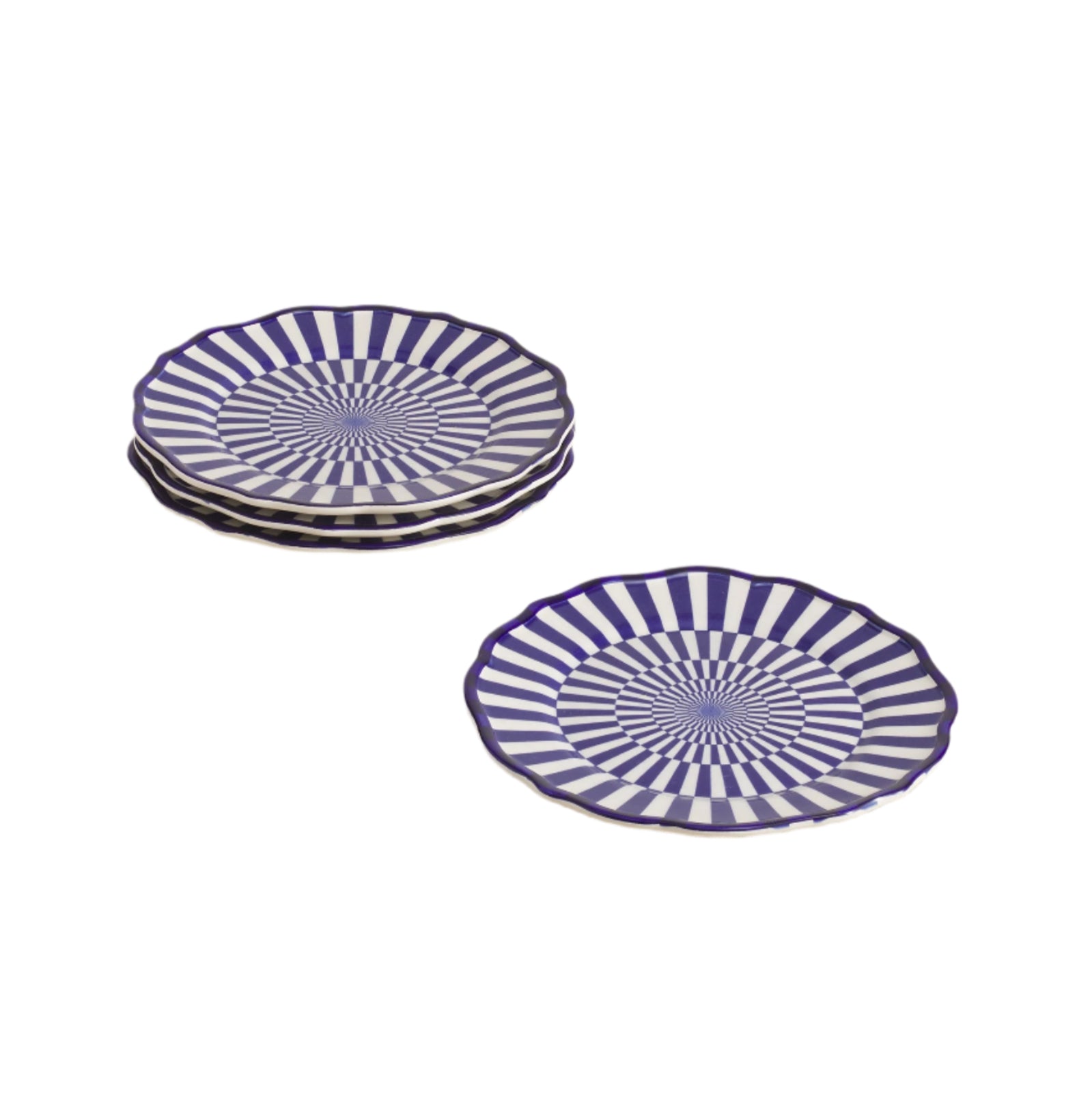 Set of 4 ceramic dessert plates with rows of short blue stripes on beige table