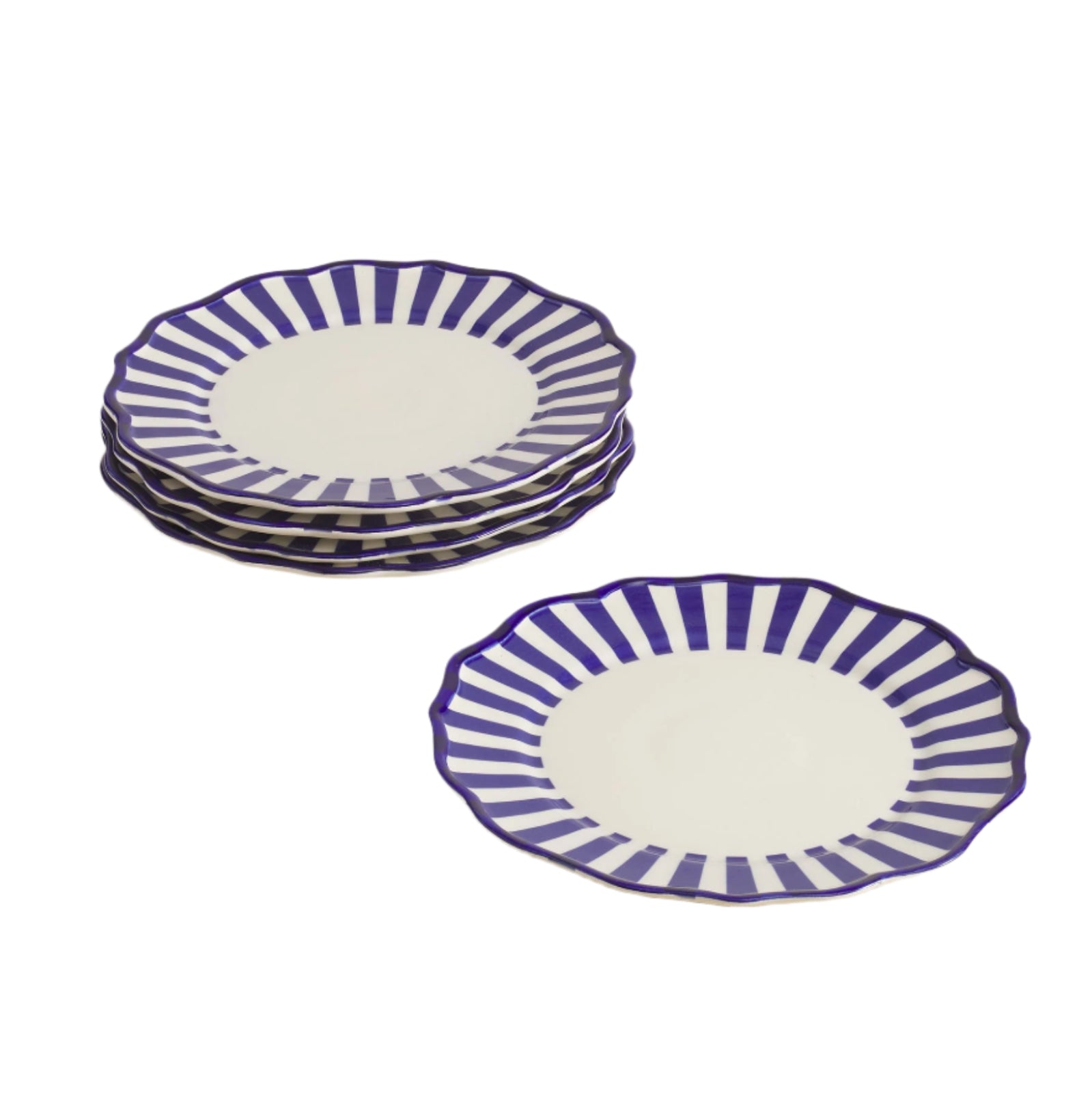 Set of 4 ceramic dinner plates with blue striped rims on a beige surface