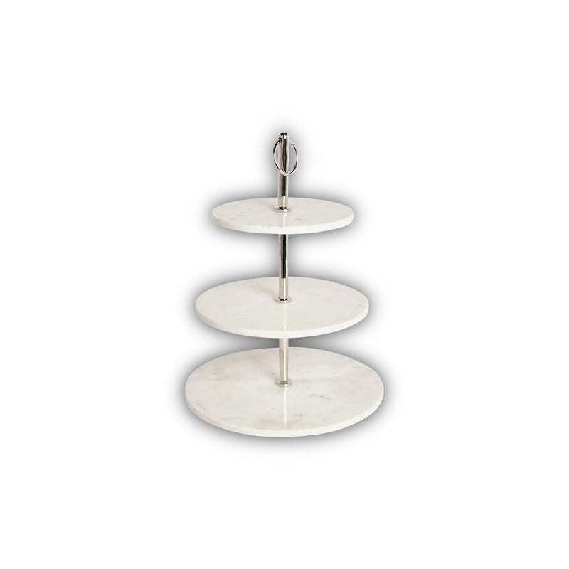 Three-tiered white marble cake stand on a white background