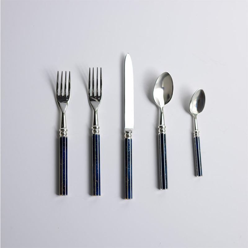 A five-piece cutlery set with royal blue handles.