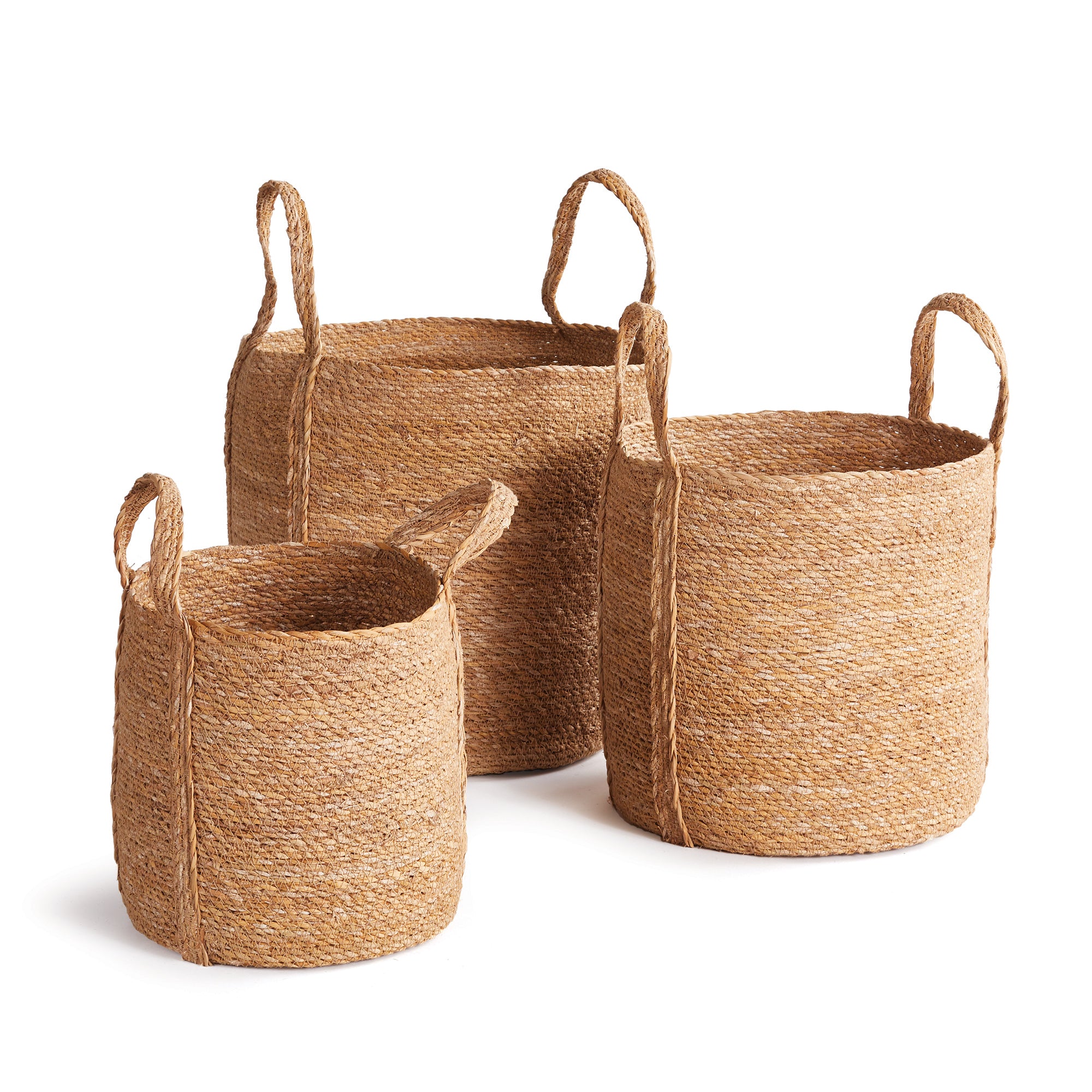 3 woven baskets with handles on white background