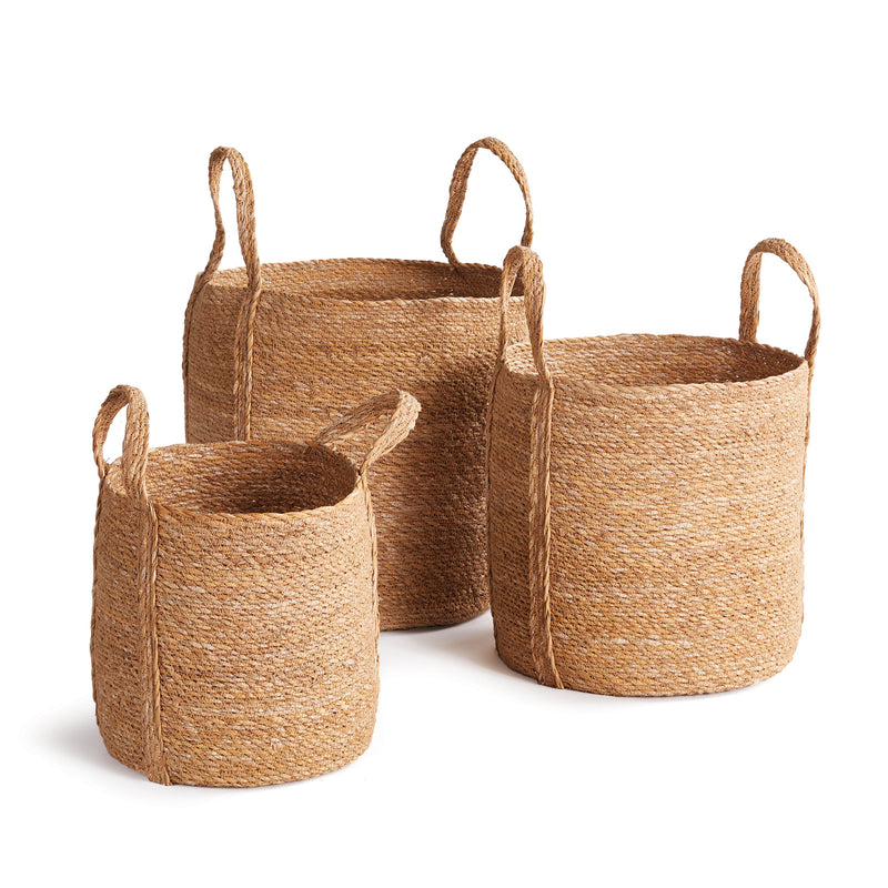 3 woven baskets with handles on white background