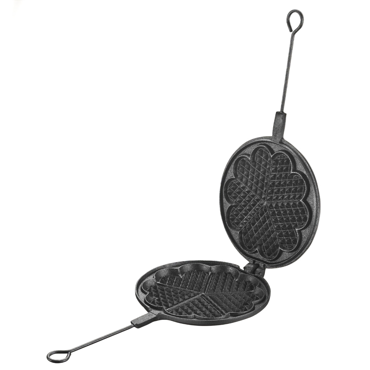Cast iron waffle maker with a decorative design on a beige background