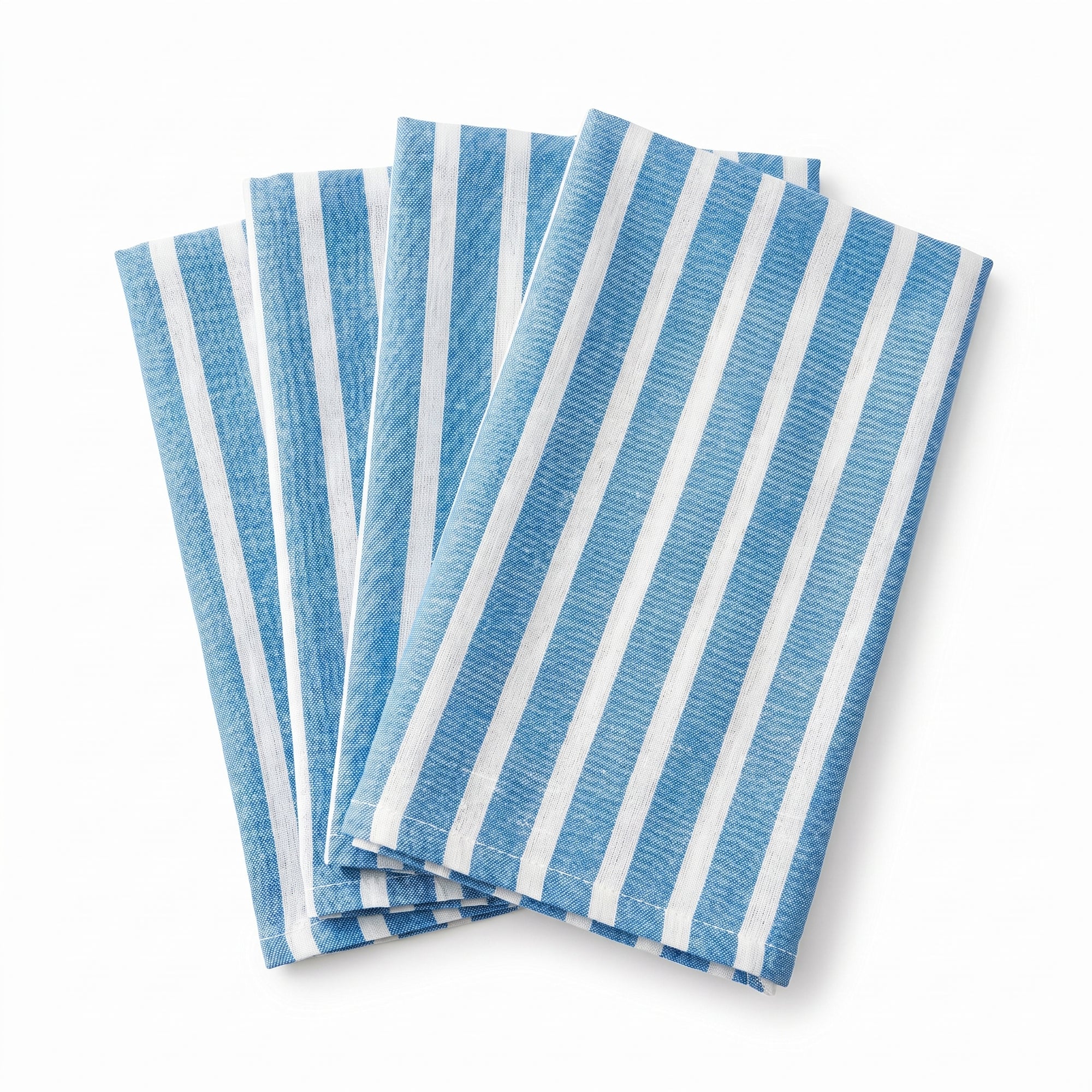 Set of blue and white striped napkins on a white background