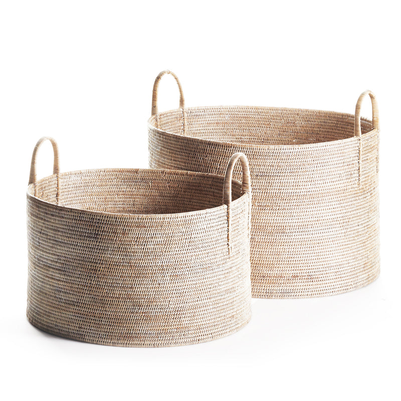 Hand-woven basket hampers with handles on white background