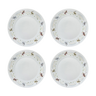 Set of 4 porcelain dinner plates decorated with polo players around the rim on a white background.