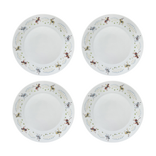 Set of 4 porcelain dinner plates decorated with polo players around the rim on a white background.