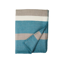 Folded blanket with blue, beige, and white stripes on a white background
