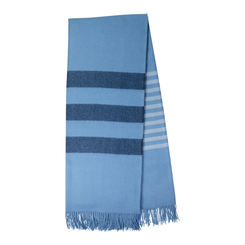 Blue striped throw with fringes on a white background