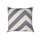Decorative pillow with blue and white chevron pattern on a white background