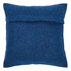 Blue textured pillow on a white background