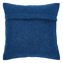 Blue textured pillow on a white background