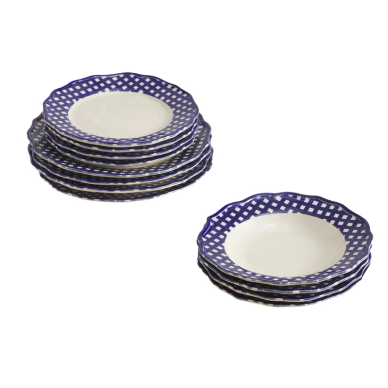 Set of 12 dishes -- blue and white gingham trim dinner plates , side plates, pasta bowls on a beige surface