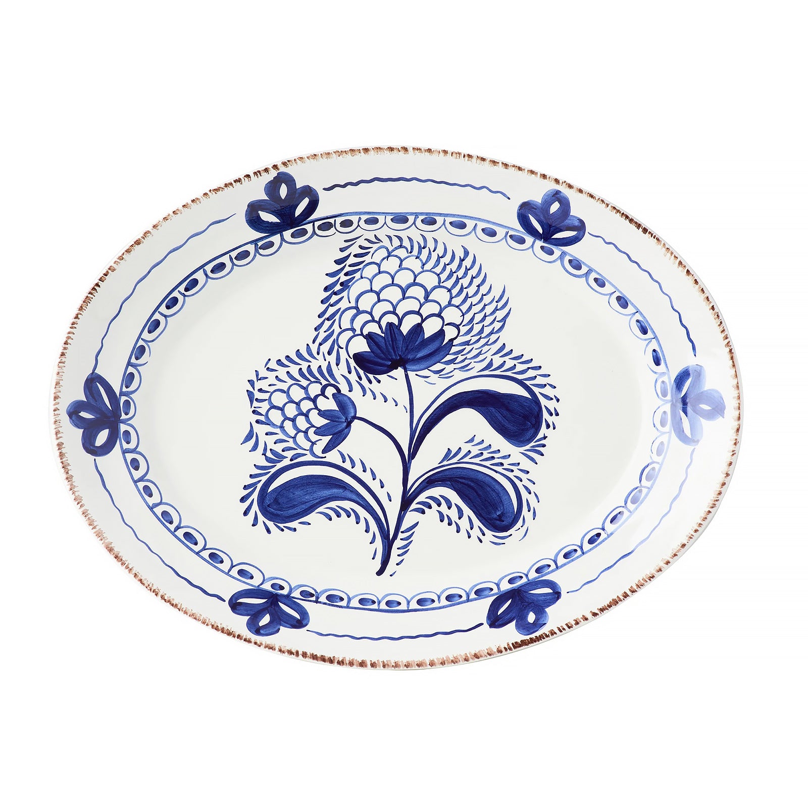 Ceramic platter with blue floral design on a white background