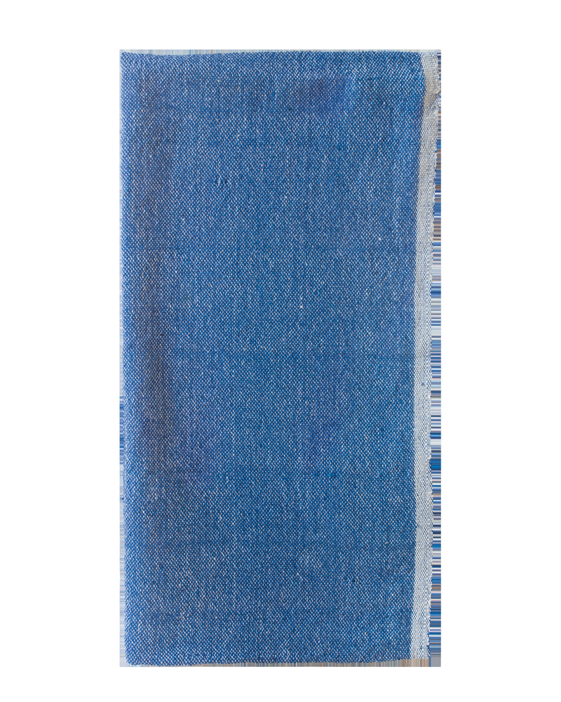 Blue denim fabric on a white background