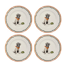 Four ceramic plates with dog illustrations on a white background