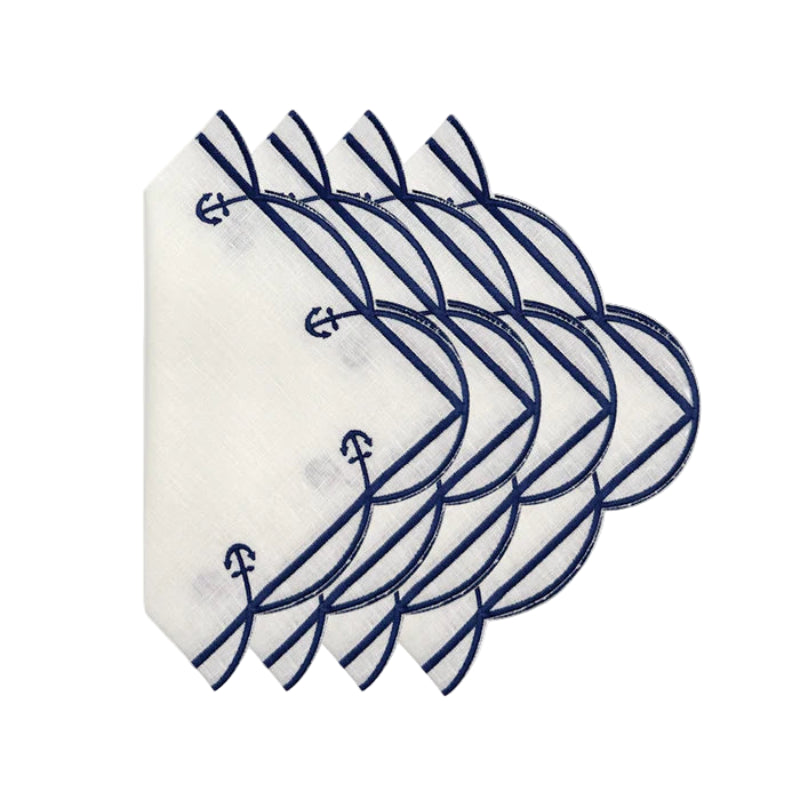 Set of white napkins with blue anchor design on a white background