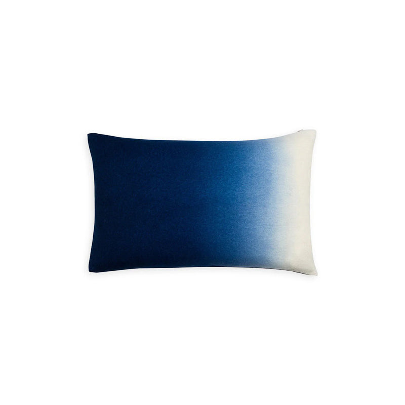Rectangular pillow with blue and white gradient on a white background