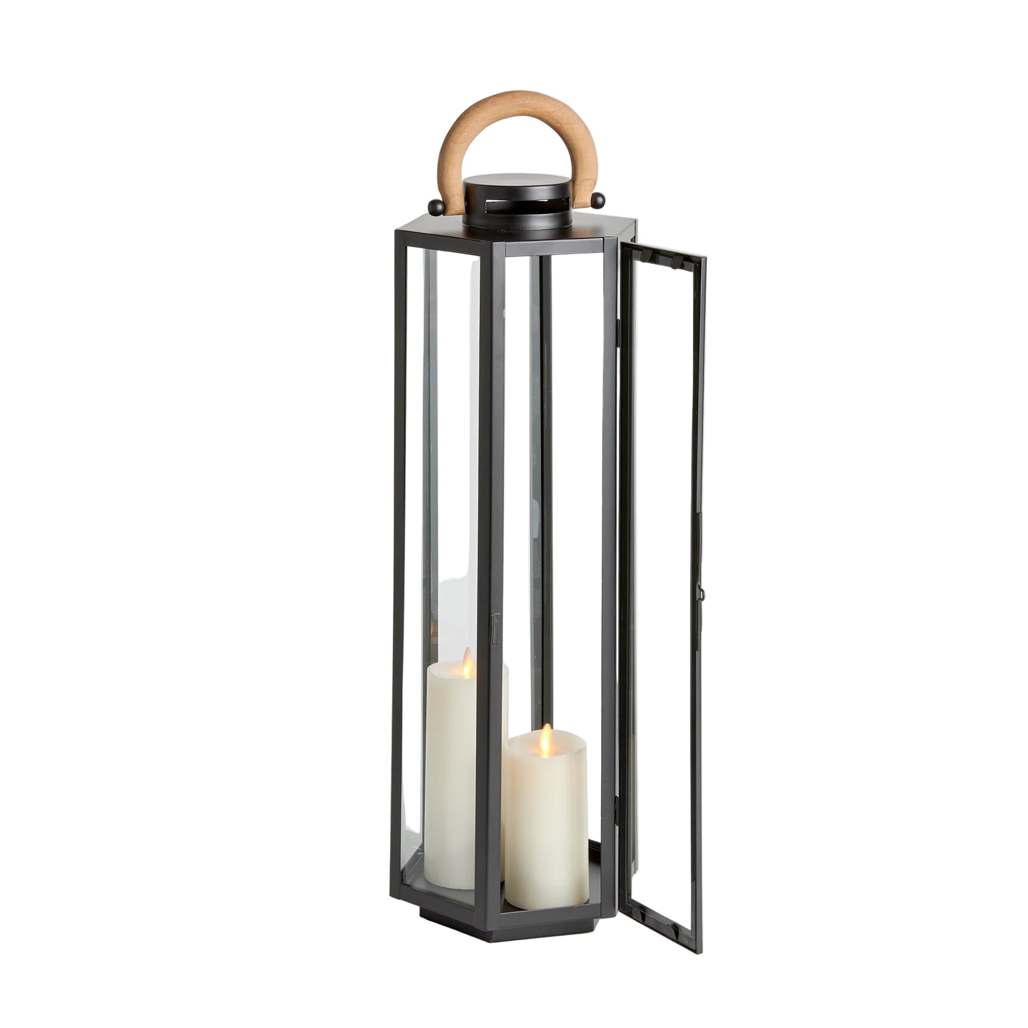 Black lantern with a wooden handle and two white candles inside on a light gray background