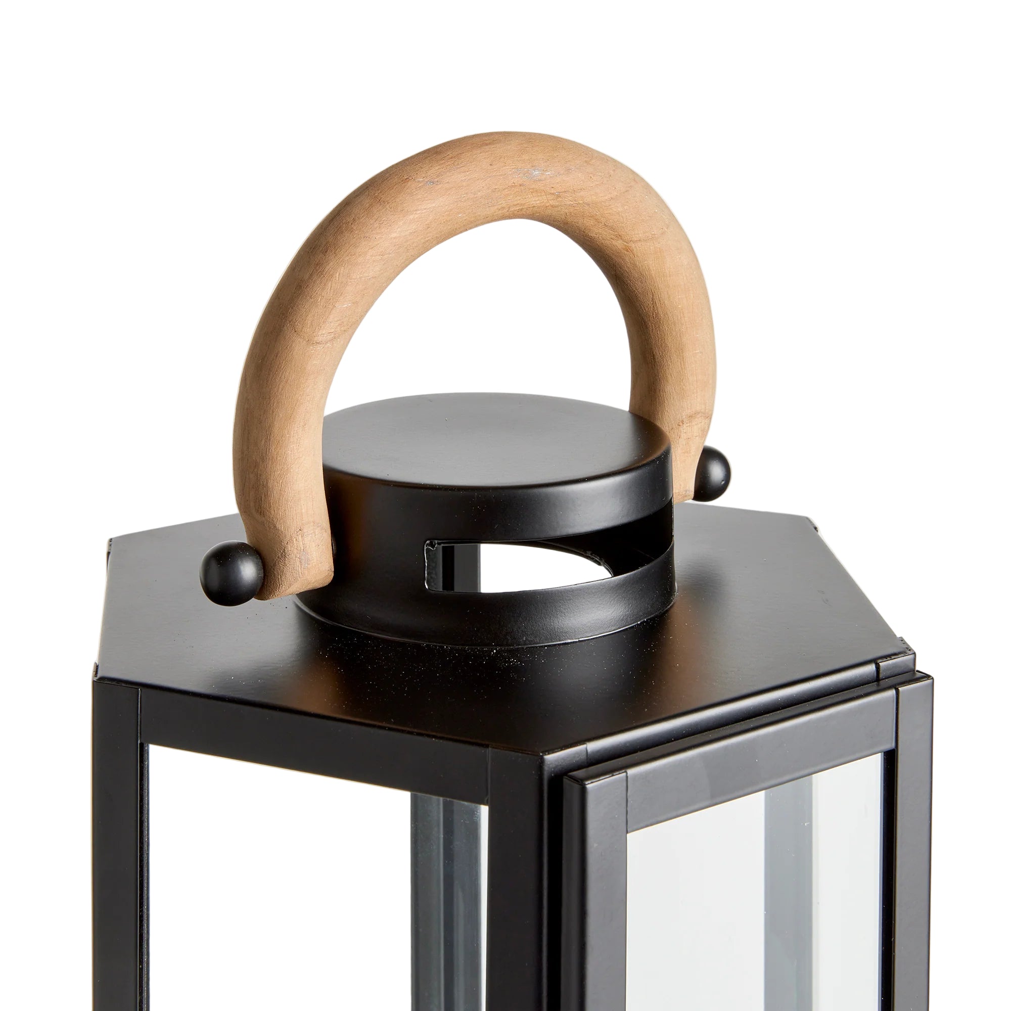 Black lantern with a wooden handle on a white background