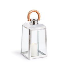 Silver lantern with a wooden handle on a white background