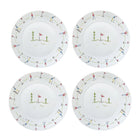 Four white plates with golf-themed decorative rims on a white background