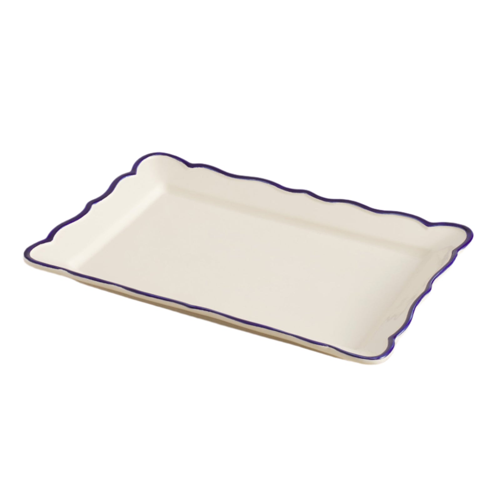 Rectangular white ceramic platter with a blue rim on a beige surface