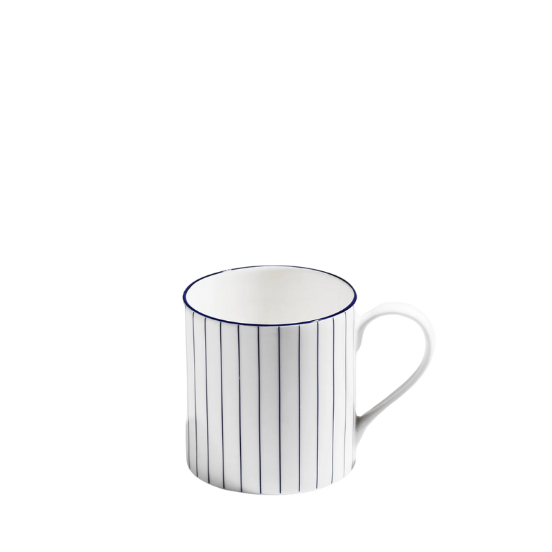 Blue and white pinstriped bone china mug on white background