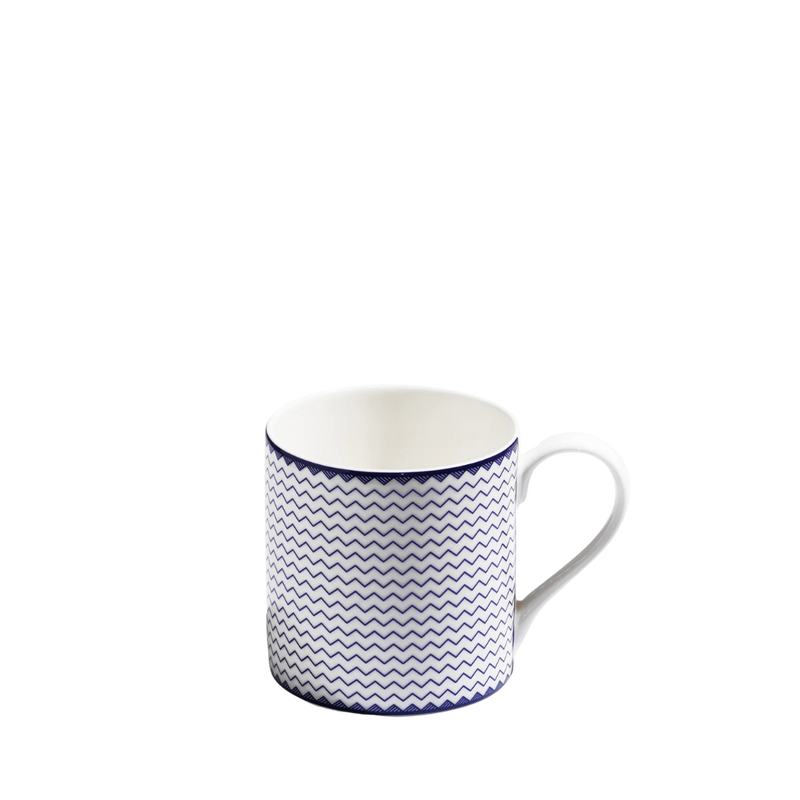 Blue and white chevron striped bone china mug on white background
