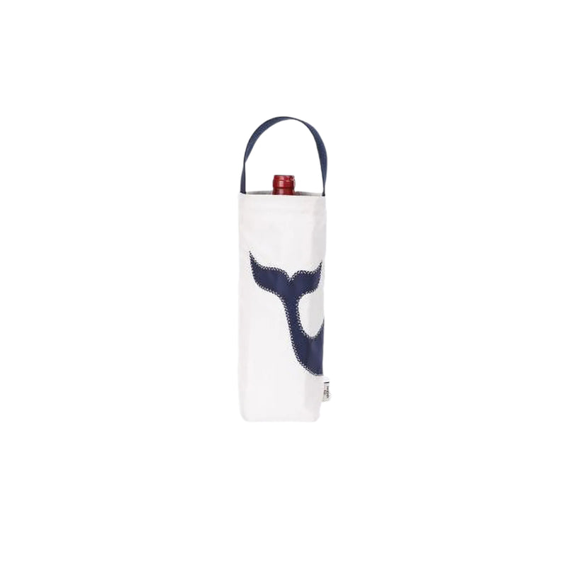 Wine bottle in a decorative bag with whale design on a white background
