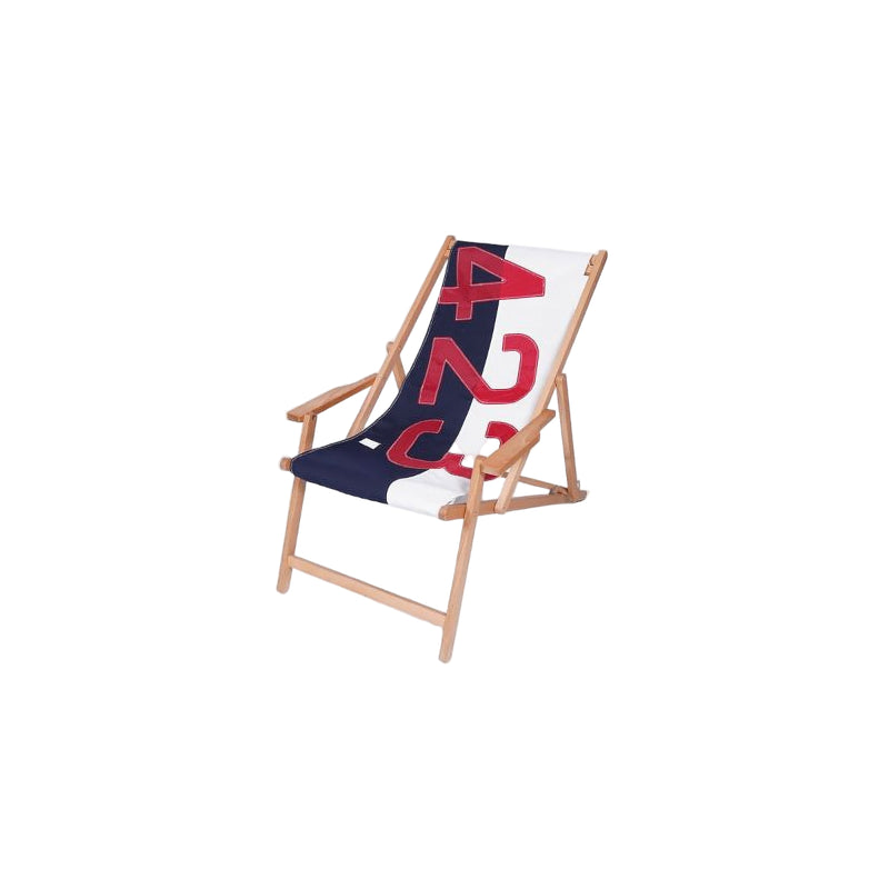 Beach chair with a navy blue towel featuring red text on a white background