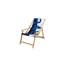 Beach chair with a blue and white striped backrest on a light gray background