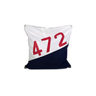 Decorative pillow with '472' printed on a white and navy background