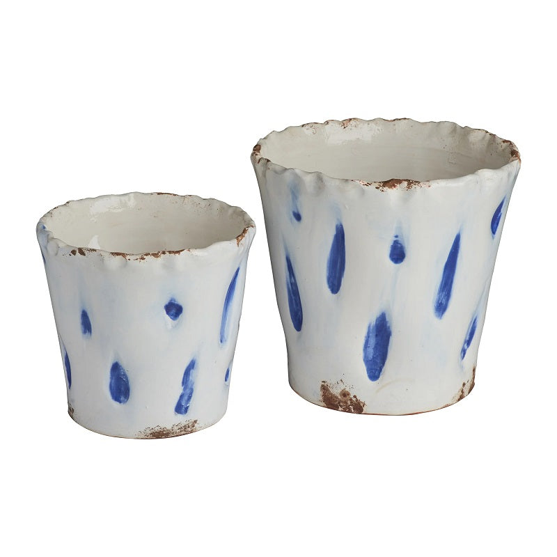 Two ceramic pots with blue speckles on a white background