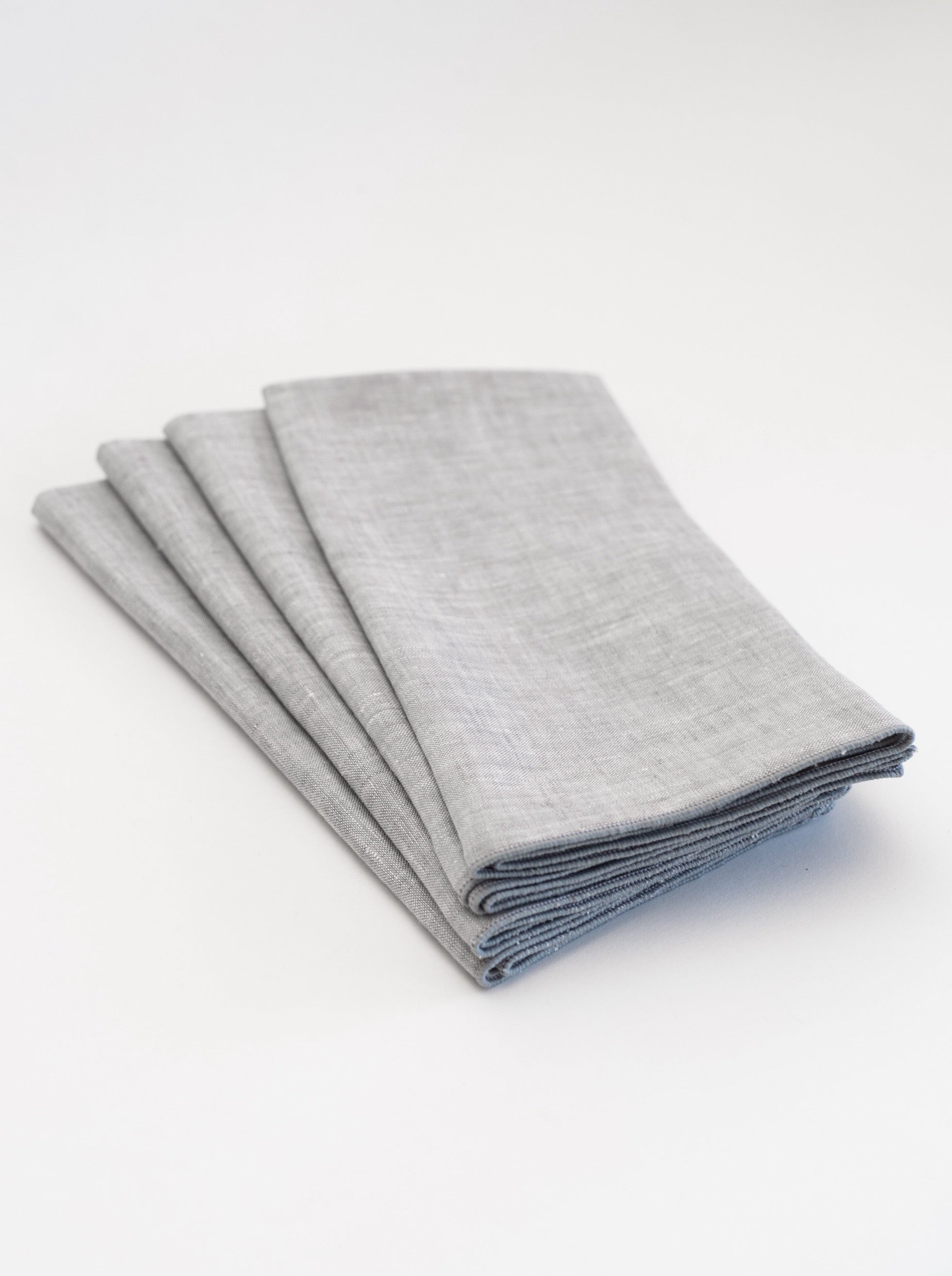Stack of gray napkins on a white background