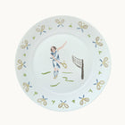 Decorative plate with a tennis player design and racket patterns on a white background