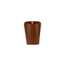 Brown leather magazine rack on a white background